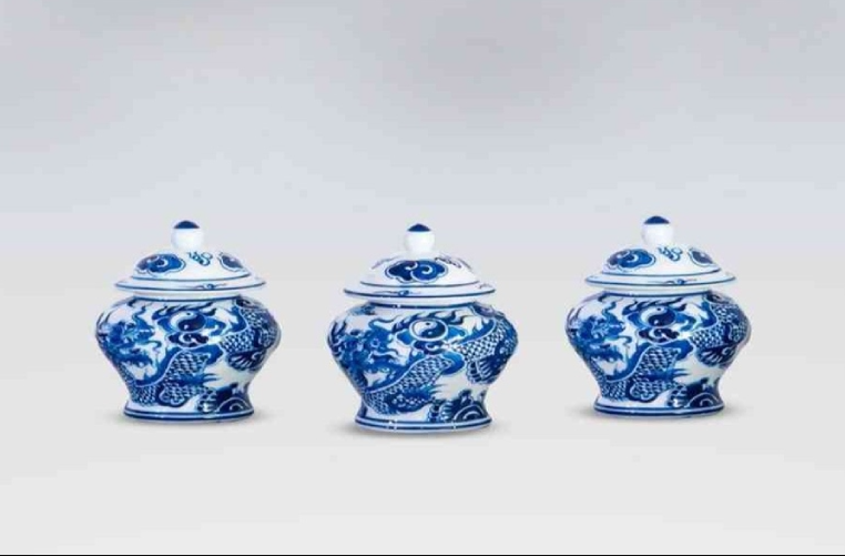 Hũ trà muối gạo Thần Tài và Thổ Địa.png